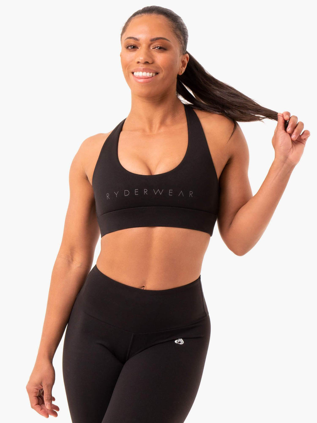 Athlete in Blue Cross Roads Ribbed Crop and Legacy Leggings